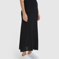 Close-up of black maxi skirt in wool blend with ribbed pointelle details.
