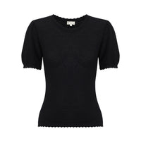Close-up of black Ruby Pointelle merino wool and cotton top with classic crew neckline.