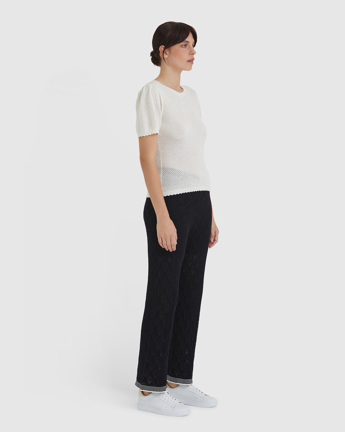 Side view of wool cotton pointelle detail top.