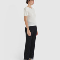 Side view of wool cotton pointelle detail top.