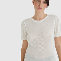 Ruby Pointelle top in cream with pointelle detailing and scalloped trims, in merino wool and cotton blend.
