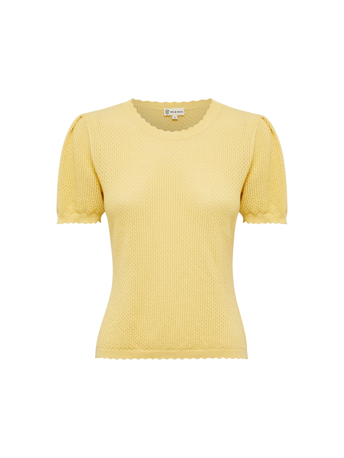 Close-up of maize Ruby Pointelle top with scalloped trims and intricate detailing.