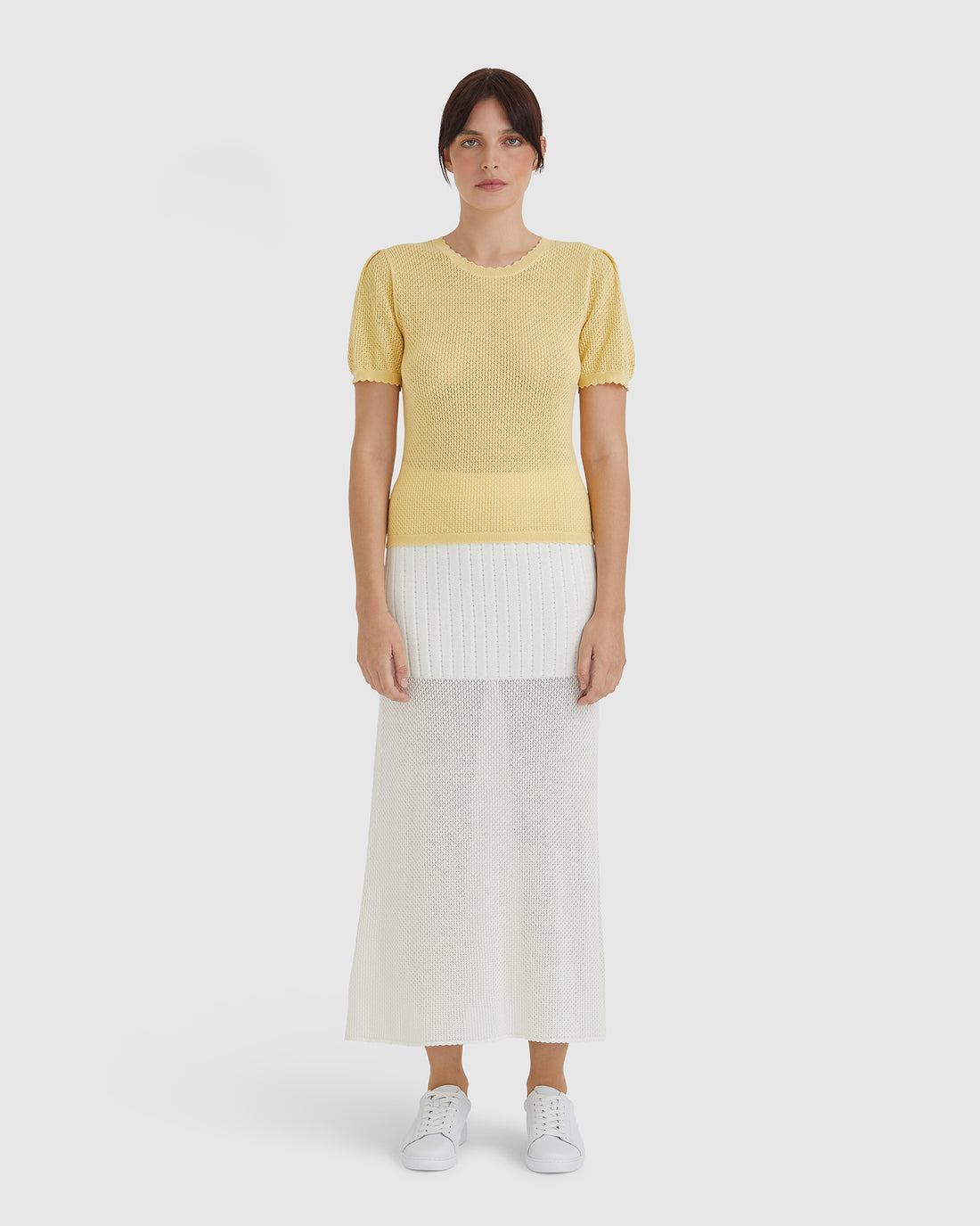 Elegant maize merino wool top, perfect for layering and timeless style.
