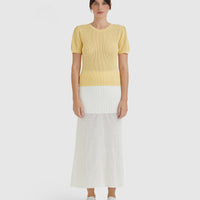 Elegant maize merino wool top, perfect for layering and timeless style.