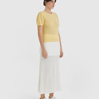 Side view of pointelle top in maize.