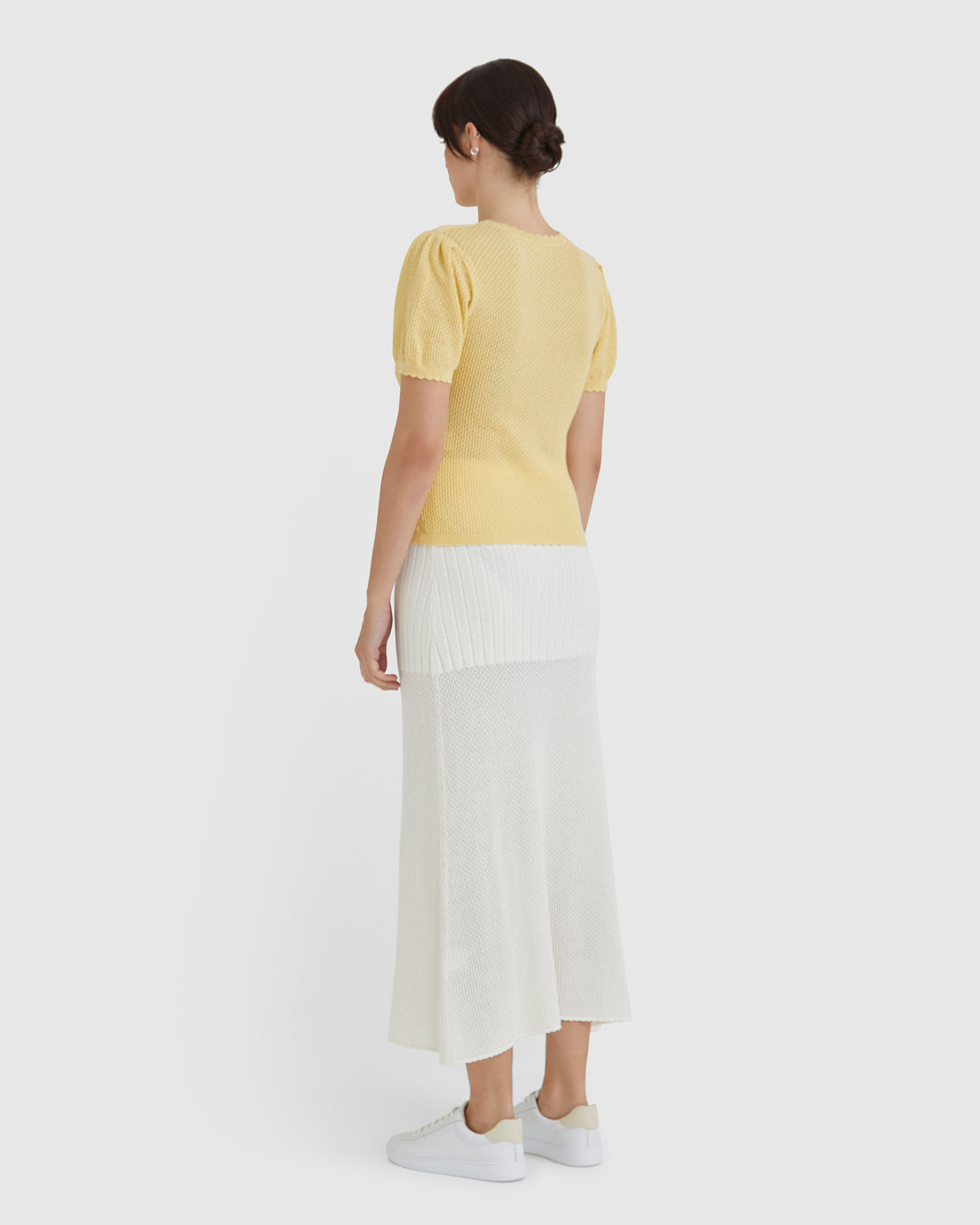 Back view of the feminine gathered sleeves of the wool cotton pointelle top.