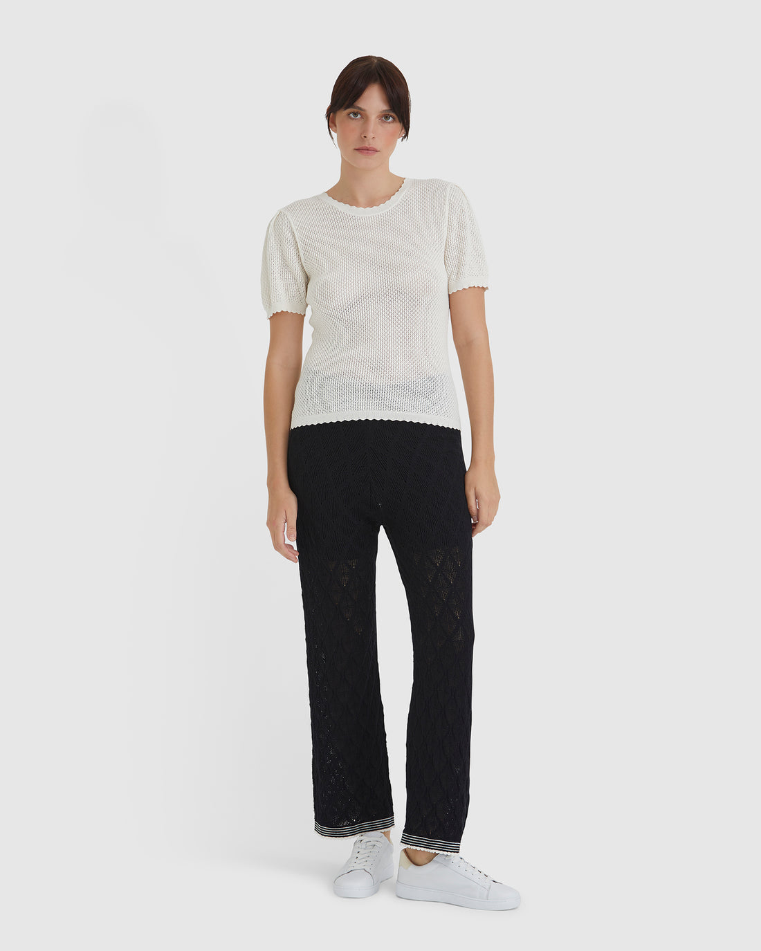 Versatile cream merino wool and cotton top with classic crew neckline and detailed knit.