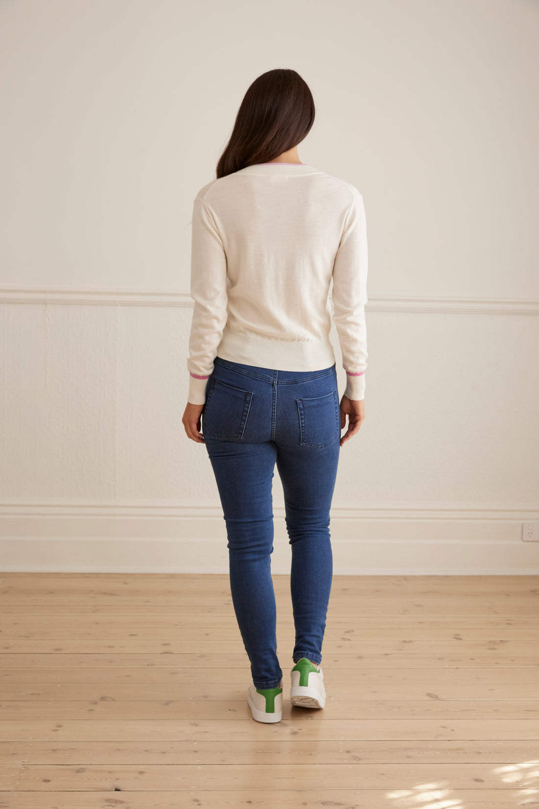 Back view of Mia jeans in merino wool blend with classic skinny fit and Iris and Wool embroidery.