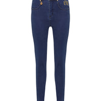 Close-up of Mia merino wool jeans with branded hardware and leather patch.
