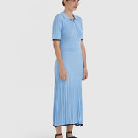 Lightweight merino wool knit dress in sky blue with mother-of-pearl buttons.