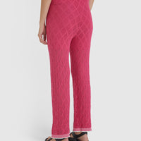 Elegant pink lace pants with jersey waistband and drawstring, ideal for summer.