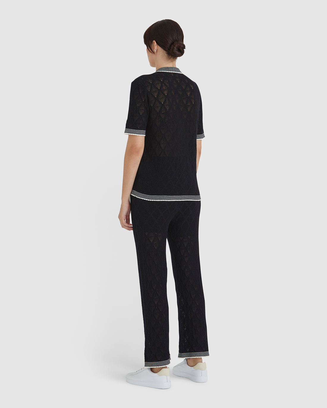 Back view of the black lace top by Iris and Wool.