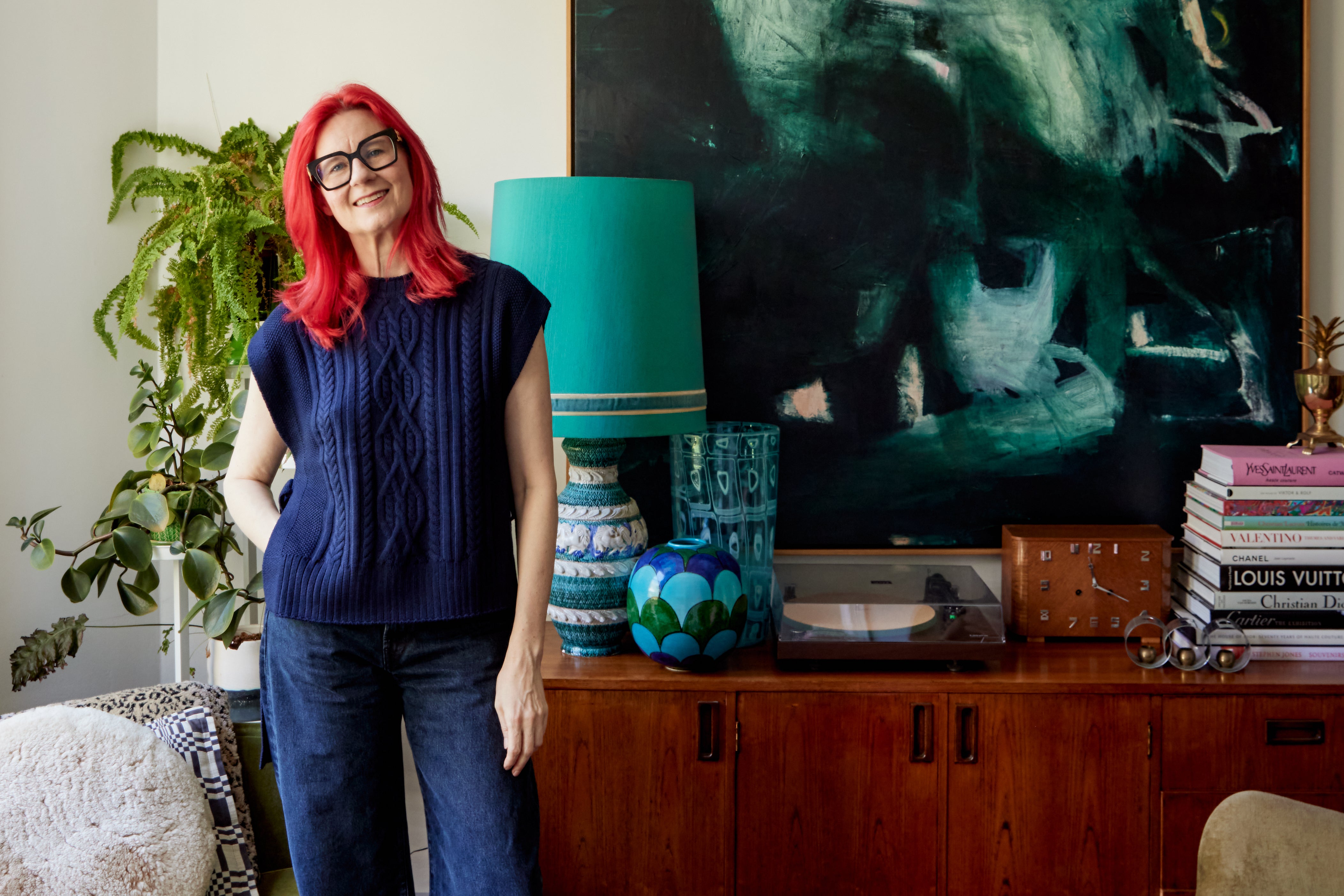 A beautiful Navy Merino wool vest - versatile, warm, and effortlessly chic on Glynis.