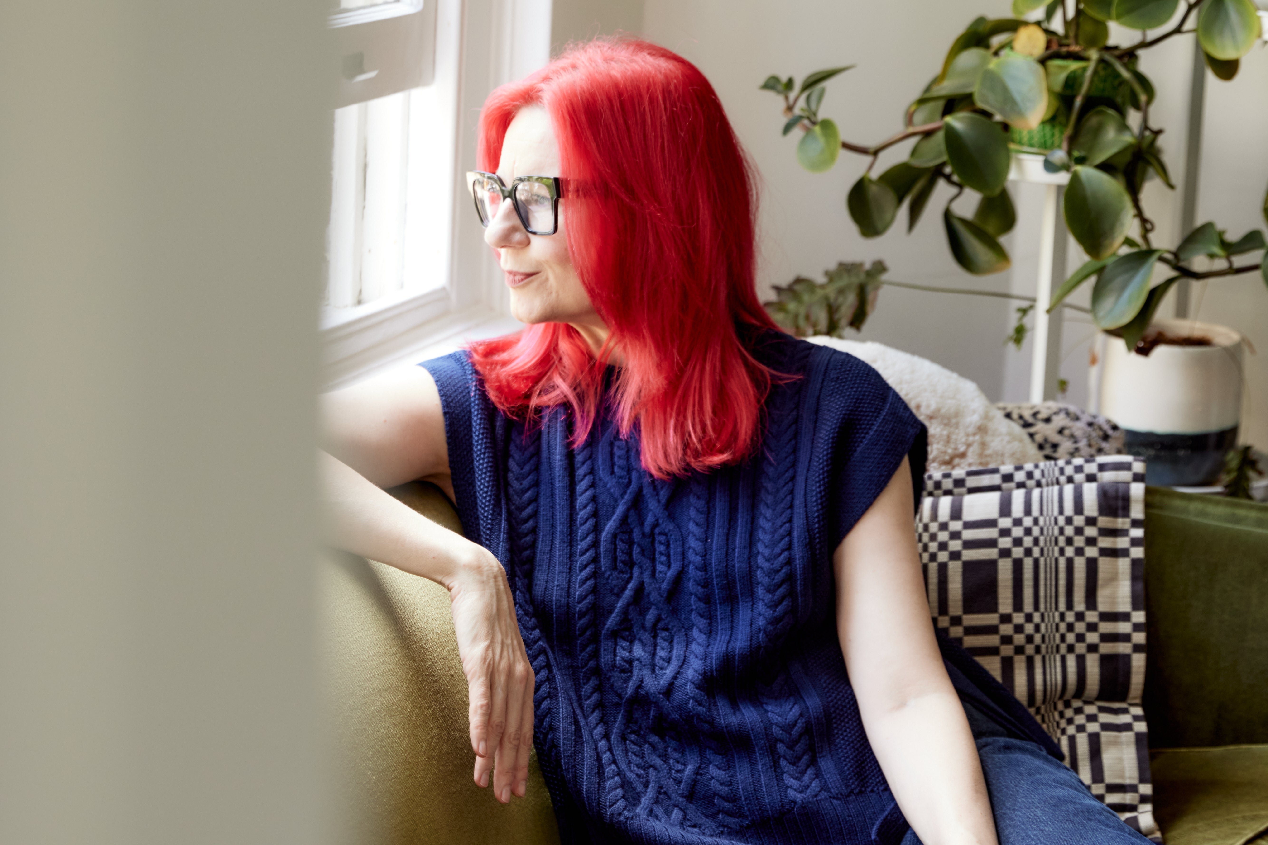 Glynis Traill-Nash in a classic Merino wool vest, layering with effortless style.