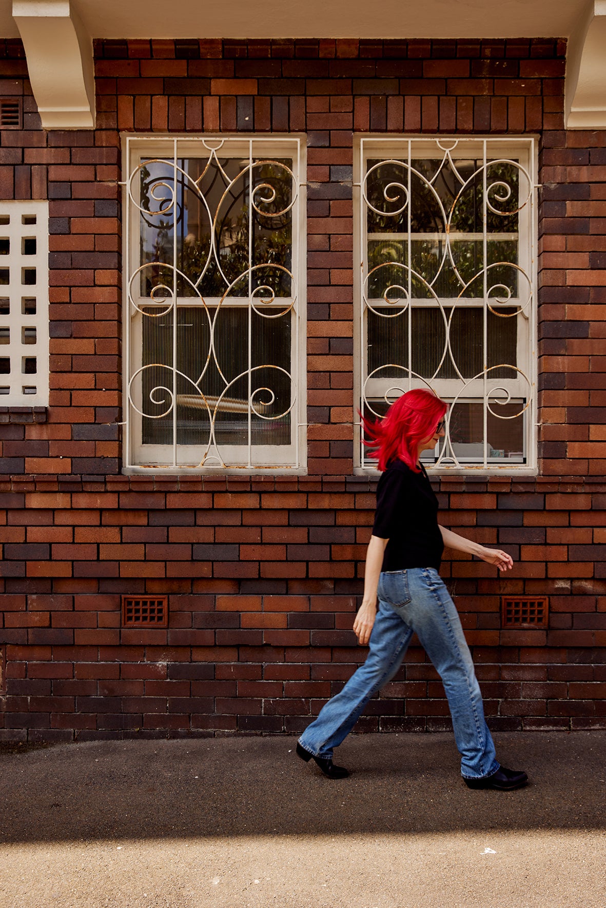 Relaxed and refined - Glynis styles an easygoing Merino wool sweater.