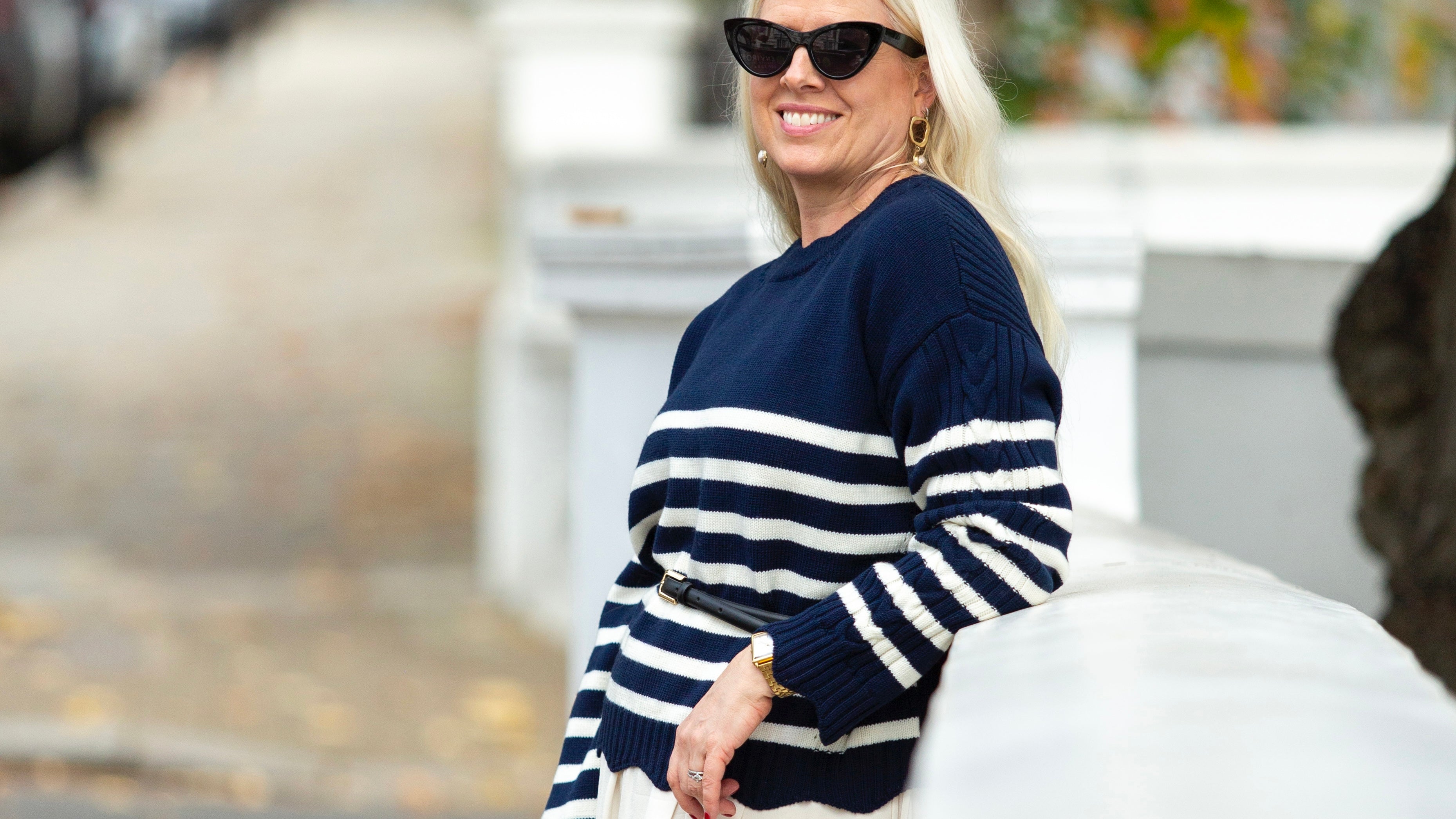 Knitwear for women takes center stage as Emily Fitch-Miller stays cozy in a timeless wool sweater.