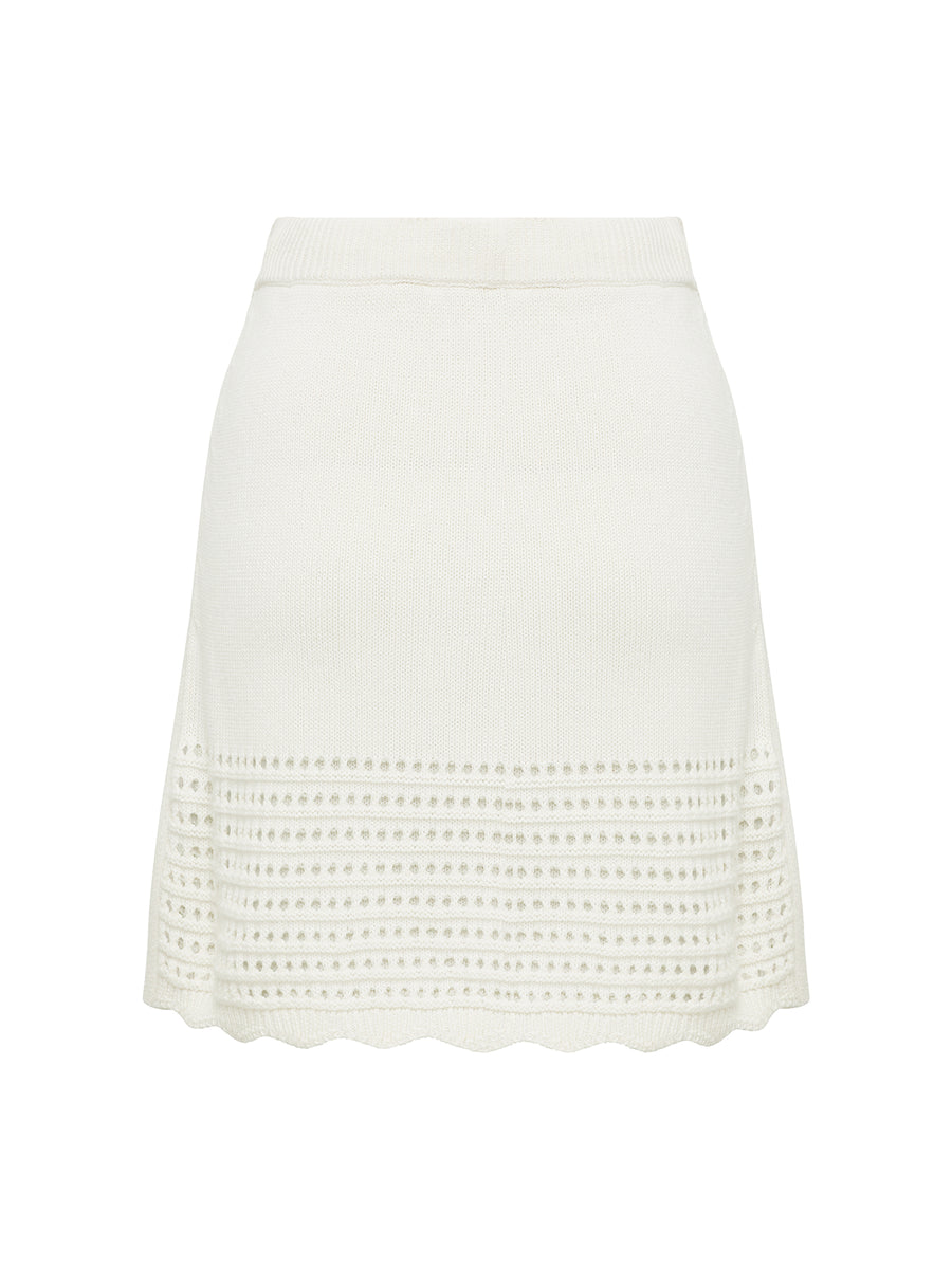 back view of mini crochet white skirt. 