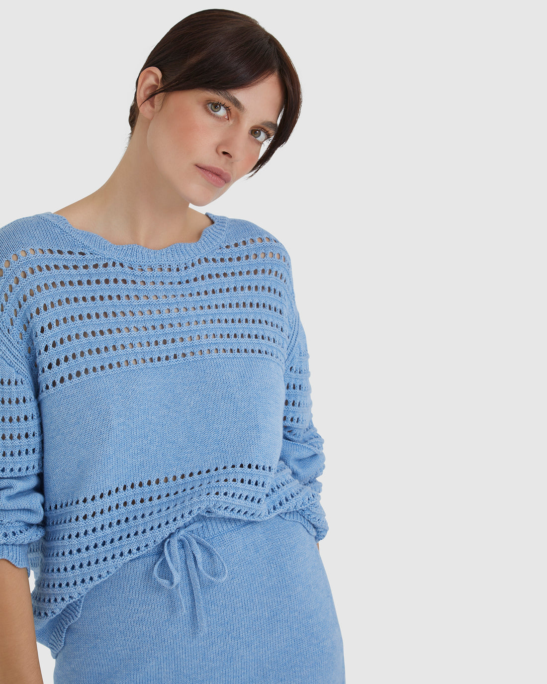 Seafoam Margot Crochet Sweater with crochet and ribbed panel design.