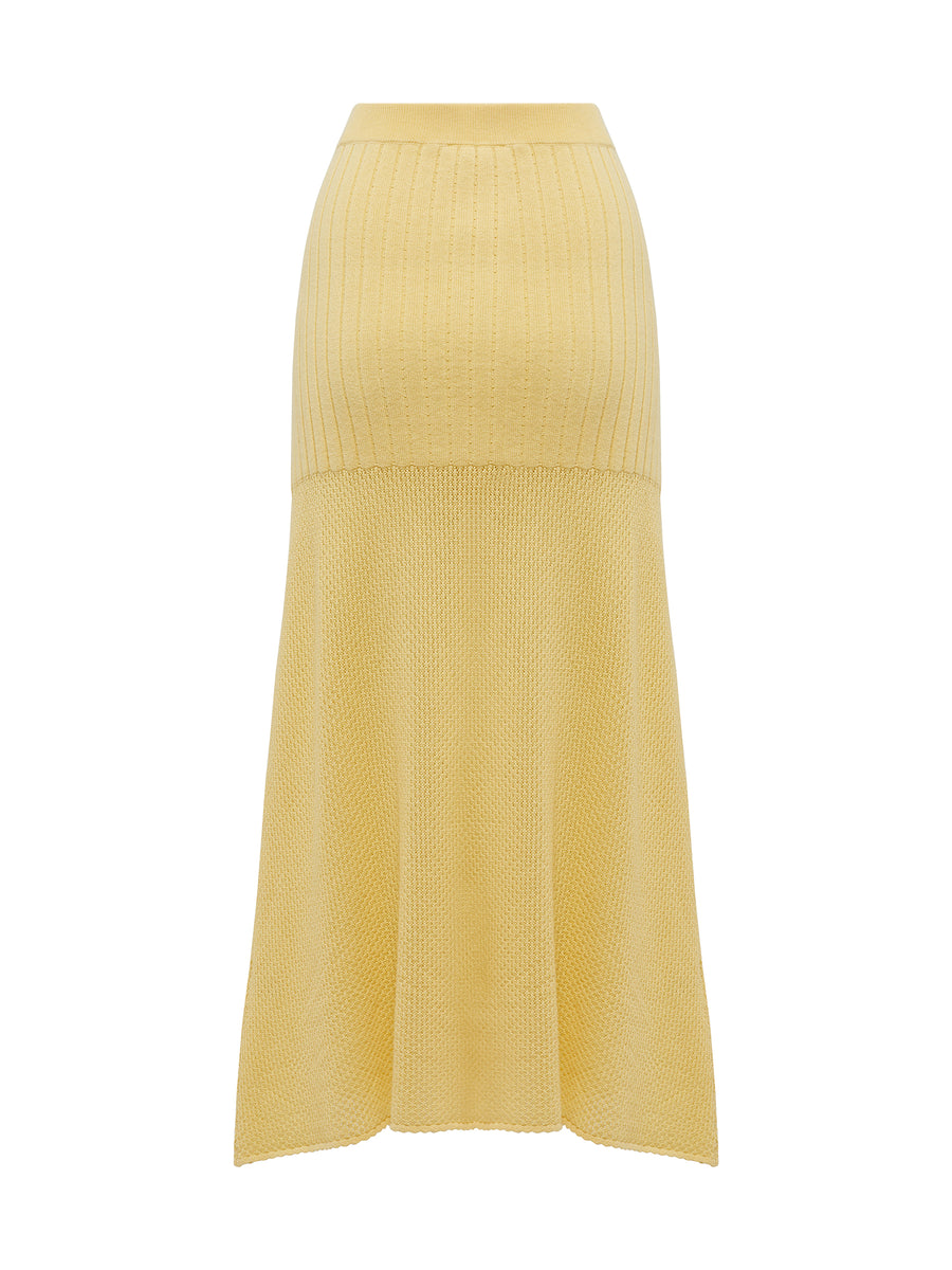 Close up of yellow maize wool skirt perfect for summer events.